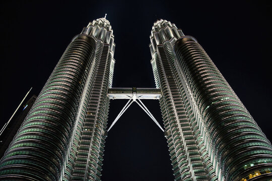 KUALA LUMPUR, MALAYSIA - JULY 18, 2023: Petronas Towers. Petronas Towers, also known as Menara Petronas is the tallest buildings in the world from 1998 to 2004.