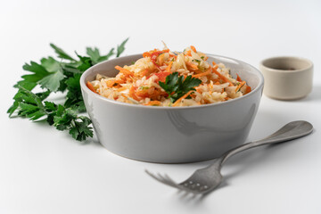 Fresh Coleslaw Salad in Gray Bowl on White Background, Healthy Food Concept