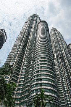 KUALA LUMPUR, MALAYSIA - JULY 18, 2023: Petronas Towers. Petronas Towers, also known as Menara Petronas is the tallest buildings in the world from 1998 to 2004.