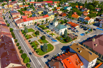 Aerial view of old town center with historic Ratusz Town Hall at Rynek market square of Sedziszow Malopolski town in Podkarpacie region of Lesser Poland © Art Media Factory