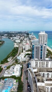 Miami Beach vertical stock video by 63rd Street and Collins Avenue 2025