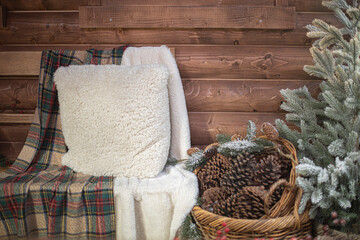 Cone and branch of fir-tree on basket