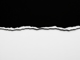 Torn paper edge with ripped black and white background texture