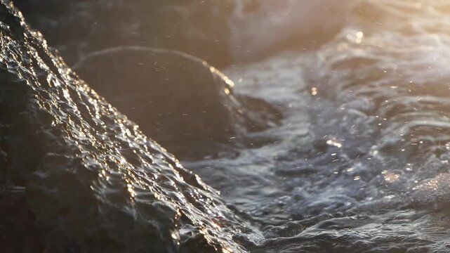Golden sea foam and rock detail close up