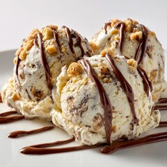 Deliciously Indulgent Ice Cream Served with Chocolate Sauce and Crushed Toppings for a Creamy Dessert Experience