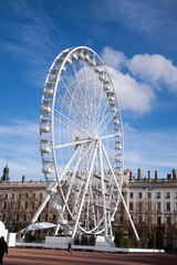 ferris wheel at place bellecour in lyon france on sunny day portrait