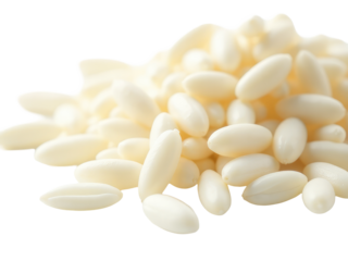 A pile of white rice sitting on a table, often used for food presentation or as a decorative element