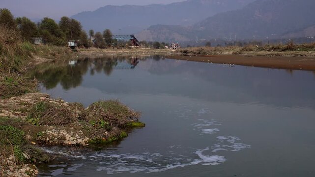 Himachal Pradesh, India &ndash; 4 December 2025: Sewage pollution entering sukati river in mandi district, himachal pradesh, india.