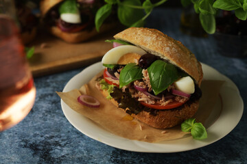 Traditional French sandwiches Pan Bagnat with tuna and salad niсoise	