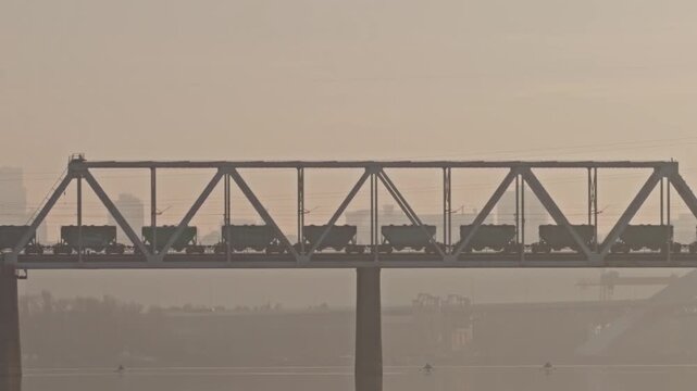 Industrial Freight Train Carrying Cargo Containers. Transportation Infrastructure 