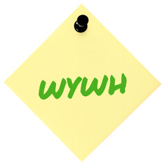 Wish you were here texting acronym WYWH, wistful longing textspeak text concept, neon green marker romance crush slang message isolated yellow adhesive post-it sticky note black pushpin macro closeup