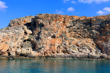 Fototapeta premium Rocks in the sea off the coast of Cyprus. Warm sea and picturesque coastal