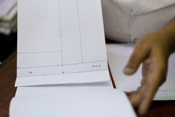 Designing custom patterns with papers and hand tools