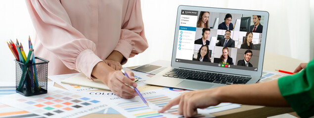 Business people on video conference for brisk virtual group meeting of corprate business office...