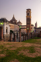 Turin, Italy. View from the Palatine Towers Archaeological Park showing the bell tower and dome of the Basilica of Turin, the Chapel of the Holy Shroud and the Museum of Antiquities at dusk.