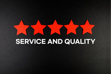 Service and Quality text with five star on black background