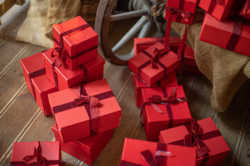 Gift boxes piled in a heap. Mountain of Christmas gifts close-up.