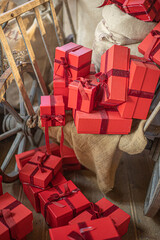 Gift boxes piled in a heap. Mountain of Christmas gifts close-up.
