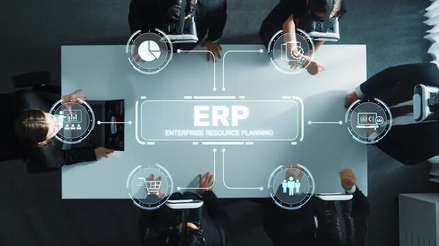 Aerial view of a business meeting showcasing ERP system features, highlighting data analytics, team collaboration, and effective resource management in modern workplaces. Raster