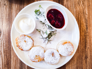 Syrniki, fried Eastern Slavic quark pancakes. homemade Syrniki, a part of Ukranian and Russian...