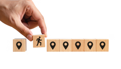 Location Planning Concept with Map Pin Icons and Wooden Blocks