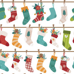 Vector seamless pattern with Christmas socks and stockings on a white background. Perfect for Christmas paper, fabric and gift designs