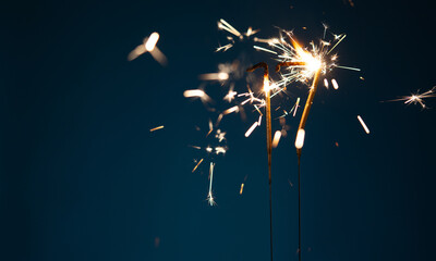 17 years celebration festive background with copy space made with Bengal fires in the form of number Seventeen.