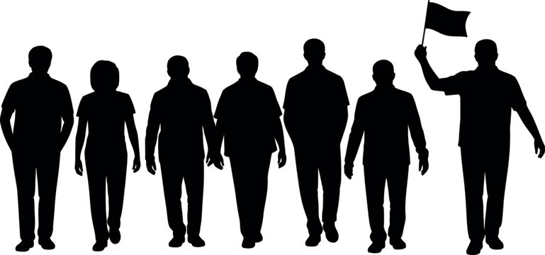 silhouettes of people walking with one holding a flag