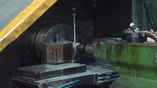 Workshop Scene Showcasing Heavyduty Metal Cutting With Coolant And Chip Extraction Methods. Media