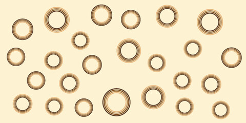 Collection of assorted metal washers on beige.
