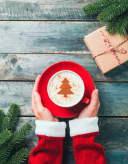 coffee cup in the shape of a Christmas tree