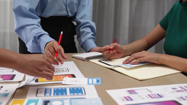 Panorama video of startup company employee planning on user interface prototype for mobile application or website in office. UX UI designer brainstorm designing user friendly interface plan. Synergic