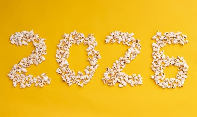 2026 Written with Popcorn Isolated on Yellow Background with Copy Space, Happy New Year 2026 Concept