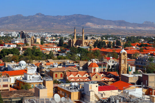 North Nicosia and Selimiye Mosque or Cathedral of Saint Sophia or Ayasofya Mosque building with minarets in North Nicosia historical city centre