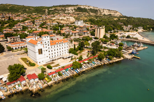 Aerial view of the contrast between the turquoise waters and the The Mill historic architecture of Balchik, Dobrich Province, Bulgaria.