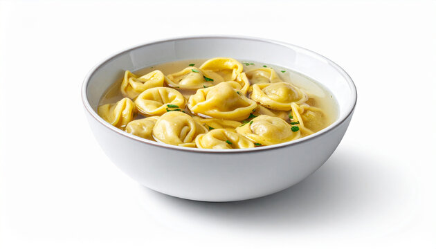 A shallow bowl of clear broth contains several small, handmade tortellini pasta filled with meat.