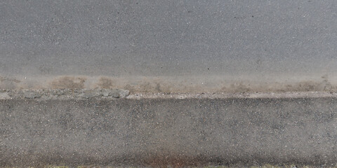 view from above on texture of asphalt road surface with cracks