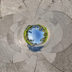 sphere inside overlooking multi-storey buildings of skyscrapers of residential complex, urban development. Transformation of spherical 360 panorama in abstract aerial view.