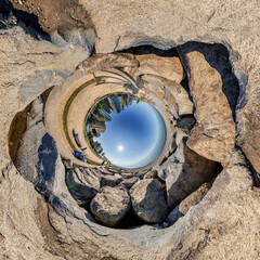 sphere inside overlooking multi-storey buildings of skyscrapers of residential complex, urban development. Transformation of spherical 360 panorama in abstract aerial view.