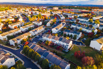 Modern real estate development in Leesburg during fall foliage  at sunrise
