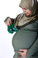 pregnant muslim woman waiting for a desired baby
