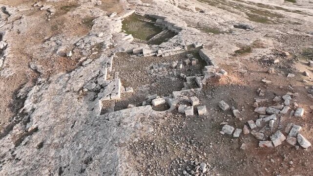 Drone aerial view of rock cut tombs and fortress graves in Sogmatar ancient site