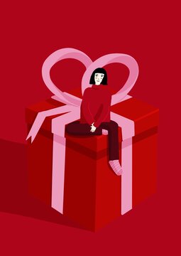 Girl on a Christmas gift box