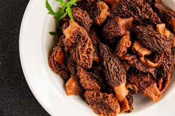 Morels mushrooms natural mushroom healthy food ingredient appetizer fresh tasty gourmet food background on the table rustic food top view copy space keto and paleo diet vegetarian and vegan food