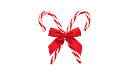 Two Red White Striped Candy Canes Tied With Red Bow Isolated On white christmas sweet