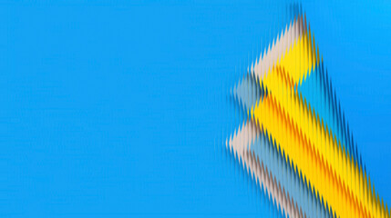 A vibrant blue background with a diagonal arrangement of yellow, blue, and grey colored pencils, creating a dynamic and artistic composition.