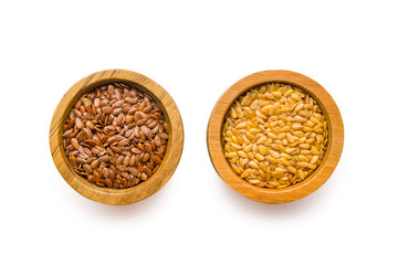 Golden and brown linseed or flaxseed. Healthy flax seed in bowl isolated on white background.
