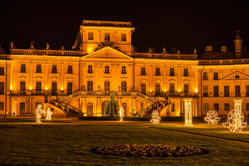 Fertőd Palace baroque architecture with Christmas light decorations
