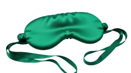 Emerald green satin sleep mask isolated PNG, comfortable eye cover for restful sleep and relaxation on transparent background