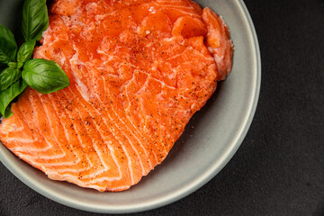 Salmon fillet raw red fish seafood dish natural tasty snack fresh delicious gourmet food background on the table rustic top view copy space pescetarian diet